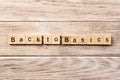 Back to basics word written on wood block. back to basics text on table, concept Royalty Free Stock Photo