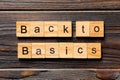 Back to basics word written on wood block. back to basics text on table, concept Royalty Free Stock Photo