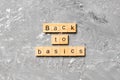 Back to basics word written on wood block. back to basics text on table, concept Royalty Free Stock Photo