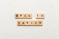 back to basics word written on wood block. back to basics text on table, concept Royalty Free Stock Photo