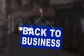 Back to business - Open sign