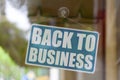 Back to business - Open sign
