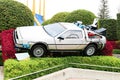 Use "Ready Player One" movie. Photo of replica car of "De Lorean"