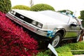 Use "Ready Player One" movie. Photo of replica car of "De Lorean"