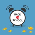 Back to school. Alarm clock with chalk text. Royalty Free Stock Photo