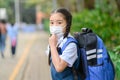 Back To School. Asian children girl wear mask to protection for coronaviruscovid-19 in the school . Portrait of Thai student