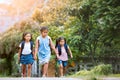 Asian pupil kids with backpack going to school Royalty Free Stock Photo