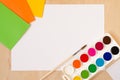 Back to school. autumn. flat lay white sheet of paper, watercolor paints, set of bright colors on the palette,