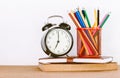 Back to school background with books and alarm clock Royalty Free Stock Photo