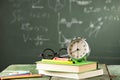 Back to school background with books and alarm clock Royalty Free Stock Photo