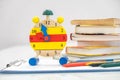 Back to school background with books and alarm clock over chalkboard. 12 o`clock. Time management concept. Close-up Of Alarm Clock Royalty Free Stock Photo