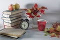 Back to school background with books and apple over blackboard Royalty Free Stock Photo