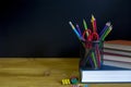 Back to school background with books over blackboard Royalty Free Stock Photo