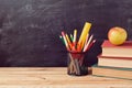Back to school background with books, pencils and apple Royalty Free Stock Photo