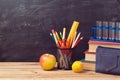 Back to school background with books, pencils and apple Royalty Free Stock Photo