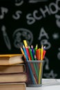 Back to school background with books, pencils and apple on white table Royalty Free Stock Photo