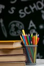 Back to school background with books, pencils and apple on white table Royalty Free Stock Photo