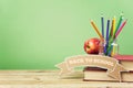 Back to school background with books, pencils and apple Royalty Free Stock Photo