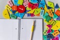 back to school background. colorful math fractions and notebook on the table. Mathematics and geometry
