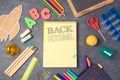 Back to school background with notebook and school supplies.View from above. Royalty Free Stock Photo