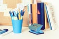 Back to school background. Stationery accessories Ã¢â¬â notebooks piles, plastic holder pencils, pens, markers, stickers, notepads,