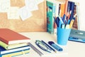 Back to school background. Stationery accessories Ã¢â¬â notebooks piles, plastic holder pencils, pens, markers, stickers, notepads,