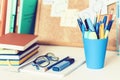 Back to school background. Stationery accessories Ã¢â¬â notebooks piles, plastic holder pencils, pens, markers, stickers, notepads,
