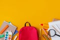 Back to school, backpack with school supplies and stationery, textbooks and notebooks. Flat lay Royalty Free Stock Photo