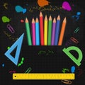 Back to school banner with colorful pencils, measure rulers, protractors isolated on abstract blackboard background Royalty Free Stock Photo