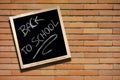 Back to School Blackboard on Brick Wall Royalty Free Stock Photo