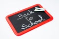 Back to school, blackboard and chalks.