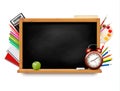 Back to school. Blackboard with school supplies. Royalty Free Stock Photo