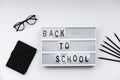 Back to School blocks with school supplies on white desk. Top vi Royalty Free Stock Photo