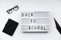 Back to School blocks with school supplies on white desk. Top vi Royalty Free Stock Photo