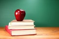 Back to School Books and Apple With Chalkboard Royalty Free Stock Photo