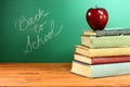 Back to School Books and Apple With Chalkboard Royalty Free Stock Photo