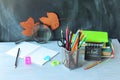 Back to school, books and blank notepad, stationery on the table