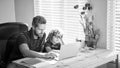 back to school. busy father and son in glasses use computer at home. family blog. Royalty Free Stock Photo