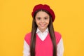 back to school. cheerful kid in beret. smiling child has long hair. skin beauty.