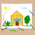 Children`s drawing with colored pencils on white paper Royalty Free Stock Photo