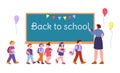 Back to school children and teacher. Woman writing on blackboard, education concept. Little happy students go study Royalty Free Stock Photo