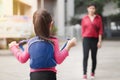 Back to school concept,Asian mother or parent taking daughter to school, asian girl carrying backpack prepare go to kindergarten Royalty Free Stock Photo