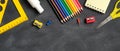 Back to school concept. Banner template with colorful schools supplies on blackboard background. Flat lay, top view Royalty Free Stock Photo