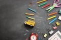 Back to school concept. bus and pencils over classroom blackboard. Top view