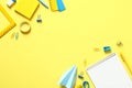 Back to school concept. Flat lay composition with school supplies on yellow background. Top view. Minimal style Royalty Free Stock Photo