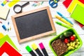 Back to school concept. Lunch box with stationery and backpack. Royalty Free Stock Photo