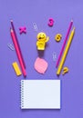 Back to school concept. School and office supplies on the office table. Violet background.Flat lay Royalty Free Stock Photo