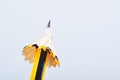 Pencil with it shavings over white background Royalty Free Stock Photo