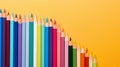 Back to school concept rainbow pencils diagonally isolated on yellow background copy space, teacher\'s day promotion banner Royalty Free Stock Photo