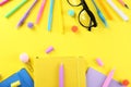 Set of school supplies on paper textured background Royalty Free Stock Photo